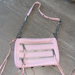 Pink Rebecca Minkoff handbag.